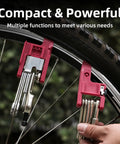 Close-up of Bike Repair Multitool Kit 21 In 1 with Carry Case attached to bike wheel showing multifunction design.
