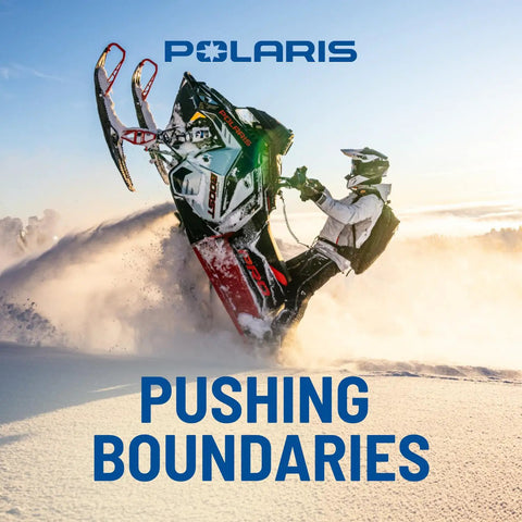 Upgrade Your Ridin Game With This Polaris Pro Series Snow Drive Belt Built Tough For RMK 9R And Boost Models To Handle Extreme Stress And Maximize Horsepower Transfer Effortlessly. Polaris snowmobile rider lifting the front skis in deep snow