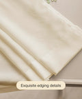 Close-up of Beige Semi Sheer Privacy Curtains for Living Room and Bedroom, 96 Inch Length Two Panels, showing edging details.