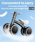 Toddler Balance Bike With Four Colorful LED Wheels That Light Up When They Move No Batteries Needed Great First Bike For 10 To 36 Month Boys And Girls Black, showing lightweight frame on blue background.
