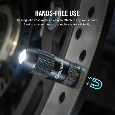 Imini 2 EDC Rechargeable Keychain Flashlight with 50 Lumens Output attached to a metal surface using magnetic cap activation, USB rechargeable.