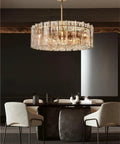 Retro American Chrome Brass Hanging Lamp Dimmable LED Pendant illuminating a dining area with elegant design and warm glow.