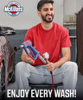 Man holding pressure washer handle near car, showcasing McKillans Wash branding, promoting enjoyment of car washing