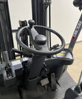 4 Wheel Electric Forklift Truck With 6600 Lb Capacity control panel, steering wheel, and pedals for smooth operation.