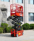 Industrial Scissor Lift Platform For Smooth Cargo Transfer And Equipment Maintenance Hydraulic Lifter, red, outdoors, raised for maintenance.