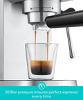 PFAS Free Espresso Machine With Steam Wand And 20 Bar Pressure, Stainless Steel Coffee Maker brewing espresso into glass cup
