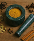 Heavy Granite Mortar And Pestle Set 3 Inch Bowl With One And A Half Cup Capacity For Grinding Spices Herbs And Garlic Make Fresh Guacamole At Home Like A Pro Grind Like A Boss Manual Kitchen Grinder Stone with turmeric and spices around