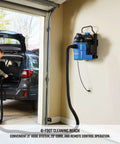 5 Gallon Wall Mount Wet Dry Vacuum With Remote Control 5 Peak HP Ultra Quiet 2 Stage Motor mounted in garage in use