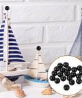 20Pcs M4 Thread Cap Nuts Knob Screws for Light Fixtures Decorative Screw Caps Steel Ball Nut Covers for Furniture and Lamp Decor Black Finish Easy Install No Tools Needed Durable and Stylish Looks Dope displayed with nautical decor.