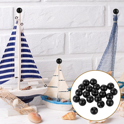 20Pcs M4 Thread Cap Nuts Knob Screws for Light Fixtures Decorative Screw Caps Steel Ball Nut Covers for Furniture and Lamp Decor Black Finish Easy Install No Tools Needed Durable and Stylish Looks Dope displayed with nautical decor.