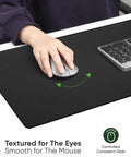 Large Gaming Mouse Pad With Non Slip Rubber Base And Edge Stitching For Desk Laptop PC Wrist Rest For Gamer Office And Home Classic Black XL 11.81 x 31.50 x 0.12 Inches featuring a smooth surface and keyboard next to it.