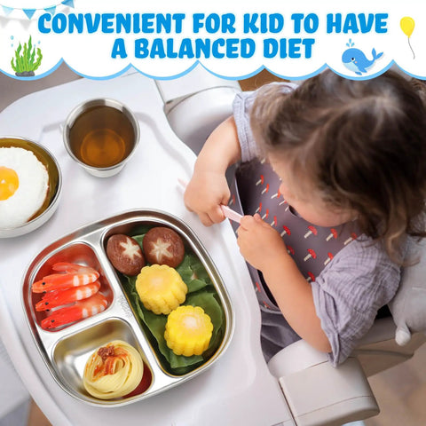 Heavy Hitter 15 Piece Stainless Steel Kids Dinnerware Set With Three Compartment Plates And Spill Proof Cups Bowls Plus Fork Spoon Combo For Toddlers Seeking Zero Stress Mealtimes And Sick Durability featuring a toddler eating from a compartment plate.