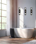 Urban Oasis Matte Black 3 Light Bathroom Vanity Fixture With Industrial Vibe above a bathtub in a modern bathroom setting