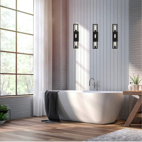 Urban Oasis Matte Black 3 Light Bathroom Vanity Fixture With Industrial Vibe above a bathtub in a modern bathroom setting