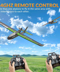 Two RC controllers operating Easy To Fly 4CH RC Plane With 6 Axis Gyro For Beginners And Adults, Ranger600 Stunt Glider in flight.