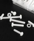 White Nylon Round Head Screw And Nut Bolt Assortment Kit Featuring Top Shelf Corrosion Resistant Fasteners laid out on a black surface.