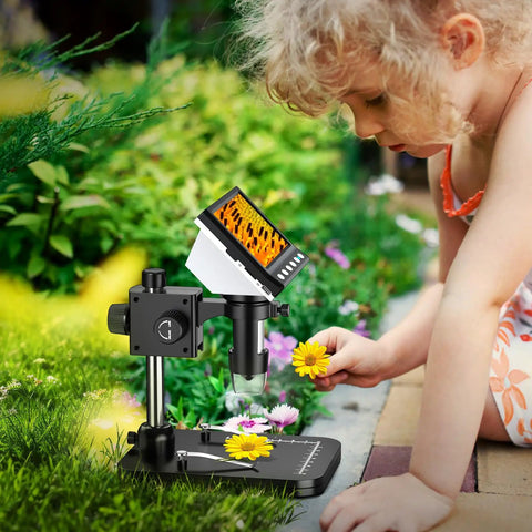 4.3 Inch IPS Digital Microscope 1000X With Built In Lights For Coin Collectors And DIY Lab Projects Crystal Clear Images On A Bright Screen Easy USB Viewing, child examining flower