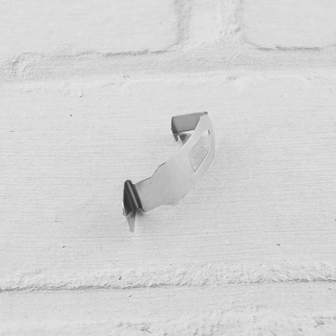 Single metal 35x13mm spring turn clip for photo frames on white background, part of 12 Pack Photo Frame Clips Picture Hanger Fastener Artwork Back Plate Fixing Hardware Metal Spring Turn Clip Hanging Supplies Silver Tone 35x13mm Ideal For DIY Frames Gallery Displays And Wall Art.