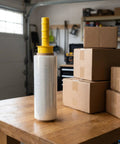 2 Pack Stretch Wrap Hand Handles With Strong Grip, Yellow Plastic 3 Inch Film Roll Dispenser For Effortless Shipping And Moving beside boxes