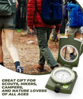 Rugged Lensatic Sighting Compass With Carrying Bag Waterproof And Shakeproof Army Green beside hikers in forest