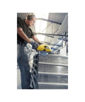 Heavy Duty Cordless Metal Circular Saw 18V 5.5Ah Battery Powered Dry Cutting Tool cutting through steel sheet in warehouse.