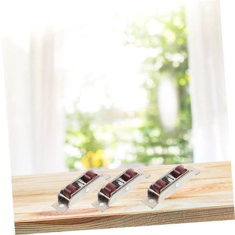 Heavy Duty Stainless Steel Double Roller Track Pulleys And Silent Glide Sash Wheels For Sliding Doors Barn Closets on wooden surface