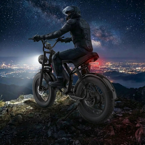 Rider on 1500W Peak Electric Fat Tire Mountain Bike For Adults With 32 MPH Top Speed, 20 Inch Fat Tires, nighttime view