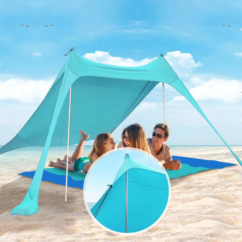 Two Pack Aluminum Beach Tent Poles For Canopy Replacement providing shade on a sunny beach day with family under blue canopy