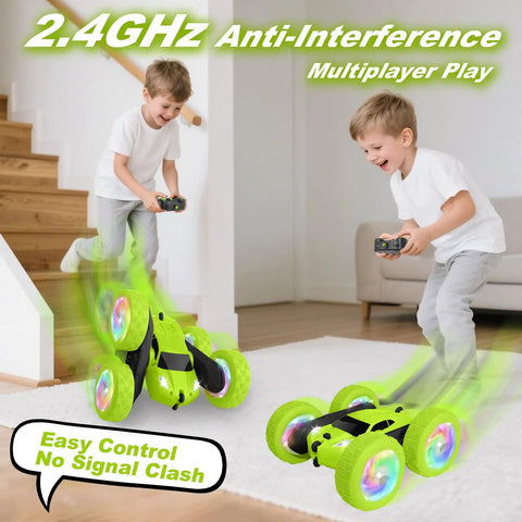 Kids playing with Rad Stunt RC Car With Two Point Four GHz Remote 360 Degree Flips Double Sided Crawler in bright green