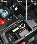Installed Mazda CX30 Center Console Organizer Tray and Armrest Storage Box showing neat storage with keys, cables, and snacks.