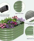 Green Galvanized Raised Garden Bed Kit Four By Two By Seventeen Inch Tall Beefy Back Friendly Metal Planter with flowers.