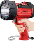 Hand holding Beast Mode Rechargeable Spotlight with Two Million Lumen LED IP67 Waterproof Long Throw Searchlight, rubber grip