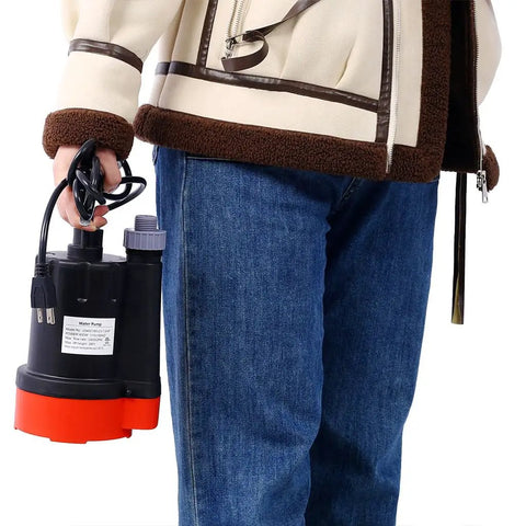 Foolproof Submersible Sump Pump With A Badass One Third HP Motor Moving 2500 GPH, compact design, held in hand for easy portability.