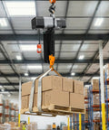 Heavy Duty 11000lb Electric Chain Hoist With Double Chain System And 30ft Lift Height For Overhead Crane lifting a pallet of boxes.