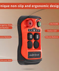 Front view of orange two-channel wireless crane remote with silicone buttons, emergency stop and status LED.