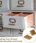 Heavy Duty Plastic Drawer Glide Pads Fix Sticky Dresser Slides With No Sweat Bottom Mount Furniture Runners 16 Pack in use on dresser drawer.