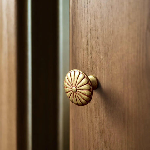 6 Pack Amber Red Cabinet Knobs 1.3 Inch Zinc Alloy Drawer Pulls Featuring Floral Radiating Texture Retro Hardware on wooden cabinet