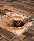 25-Foot Steel Drum Auger Plumbing Snake With Drill Attachment clearing a clogged drain, showcasing 1/4 inch cable in use