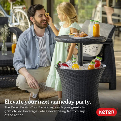Man and child enjoying drinks by Outdoor Bar Table With Hidden Seven Point Five Gallon Beer And Wine Cooler Pop Up Bar.