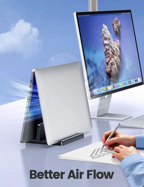 Desk Friendly Vertical Laptop Stand Dock 3 In 1 Holder For Laptop And Phone Or Tablet holding laptop beside monitor