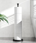 Free Standing Toilet Paper Holder With Reserve Function And Stainless Steel Spare Roll Storage in modern bathroom setting.