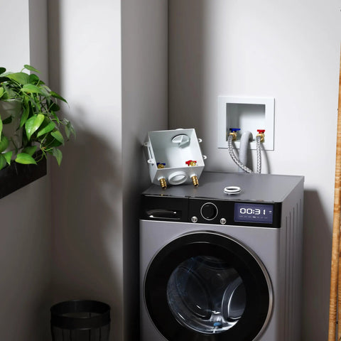 Washer Box With Pex A Expansion Inlet One Half Inch To Three Quarters Inch MHT Outlet Brass Valves Installed And Four Expansion Rings For Easy Hookup To Your Washing Machine And Laundry Piping installed above a washer
