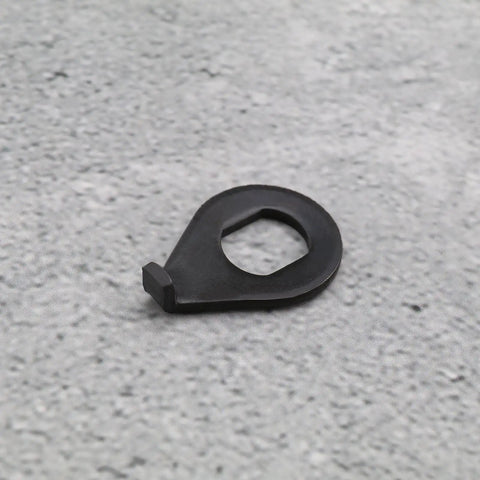 Close-up of single metal 12 Pack M8 M10 Bike Wheel Hub Hook Washer on a gray surface, showing the retaining clip design.