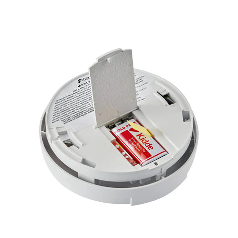 Hardwired Heat Detector With Battery Backup And Dual LEDs, showing open battery compartment with 9V battery, for garage safety.