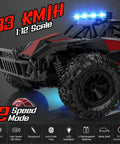 Ultra Fast One To Twelve Scale Remote Control Car Dope Off Road Monster Truck with rugged tires and LED headlights