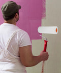 Top Shelf Sponge Paint Roller Head Replacement For Flawless Wall Painting And Crisp Trim Edges Featuring A Comfortable Handle For Zero Stress Home Projects in use on a wall.