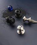 Black Interior Door Knobs Set Non Locking Privacy Hall Door Handle Vintage Vibe Lever With Smooth Edge And Easy Grip For Bedroom And Bathroom Doors Built To Last displayed on scattered black and blue grains background