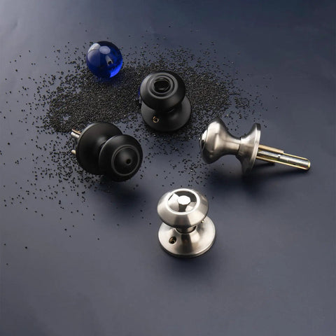 Black Interior Door Knobs Set Non Locking Privacy Hall Door Handle Vintage Vibe Lever With Smooth Edge And Easy Grip For Bedroom And Bathroom Doors Built To Last displayed on scattered black and blue grains background