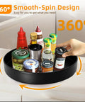 Heavy Duty 12 Inch Metal Lazy Susan Organizer With 360 Degree Spin Anti Rust Turntable holding condiments on kitchen countertop.