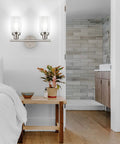 Two Light Vanity Lights Brushed Nickel Wall Sconce With Clear Glass Shade For Modern Bathroom Lighting That Lets Your Space Shine Wall Mount For Mirror Hallway Living Room Or Bedroom E26 Base Bulbs Not Included in a bedroom